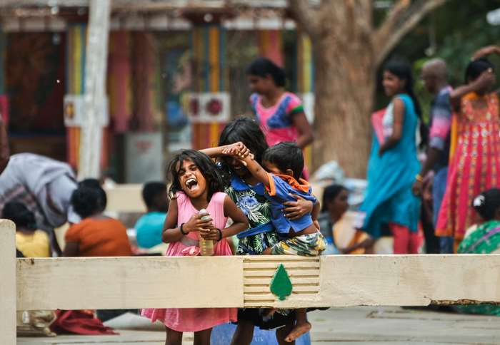 Children laughing and playing together