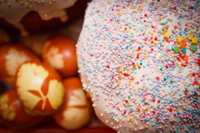 Close up of decorated Easter cake and eggs