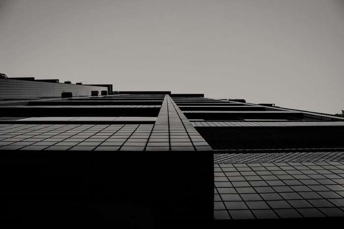 Low angle shot of a modern building exterior against the sky