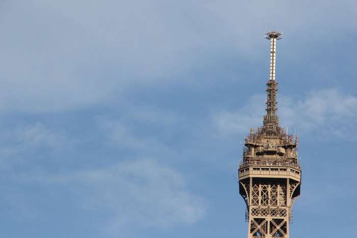 Eiffel Tower antenna against a blue sky