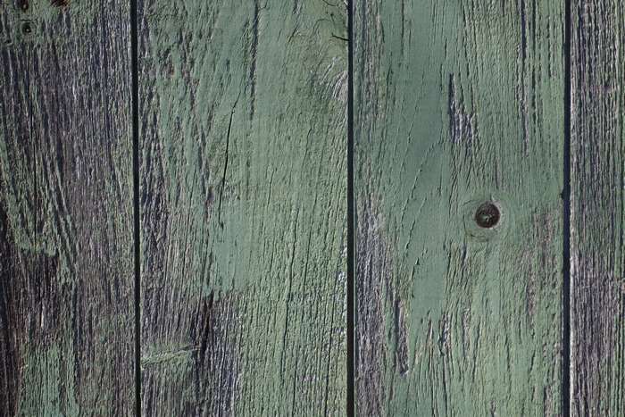 Weathered green painted wood texture