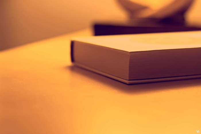 Book on a table with soft lighting