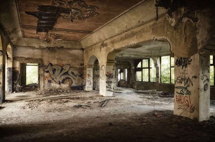 Abandoned building interior with graffiti