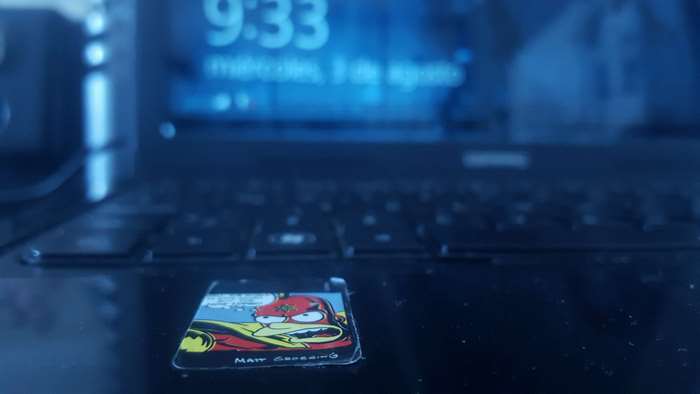 Bart Simpson sticker on a laptop keyboard