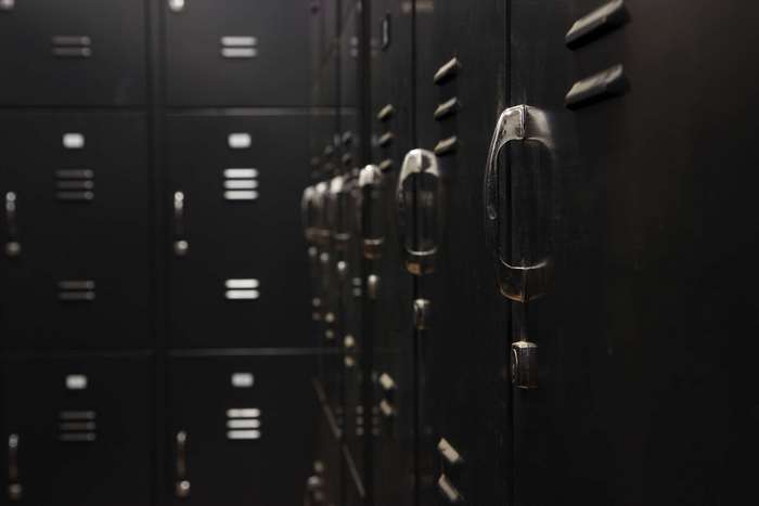 Row of dark metal lockers