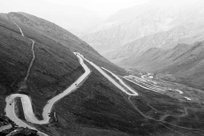 Zigzag mountain highway in black and white