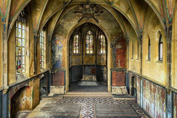 Abandoned Gothic Chapel with Stained Glass and Frescoes