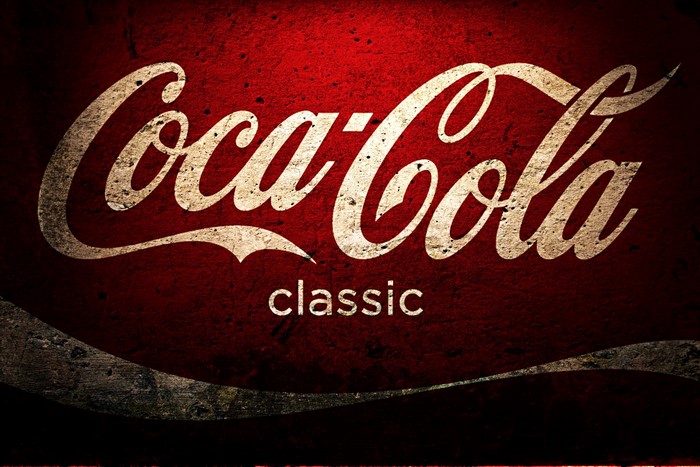 Coca-Cola Classic logo on red textured background