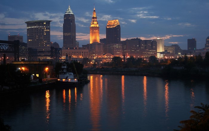 Cleveland skyline at dusk with river reflections