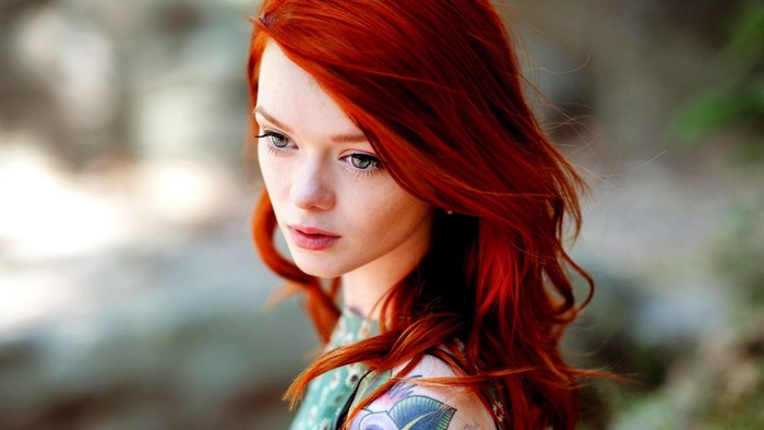 Redhead Woman with Tattoo in Natural Light