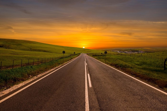 Road at Sunset with Green Hills