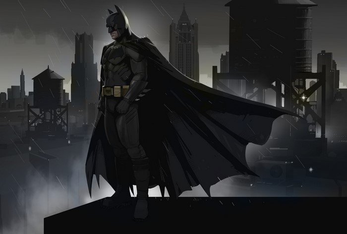 Batman standing on a rooftop in Gotham City