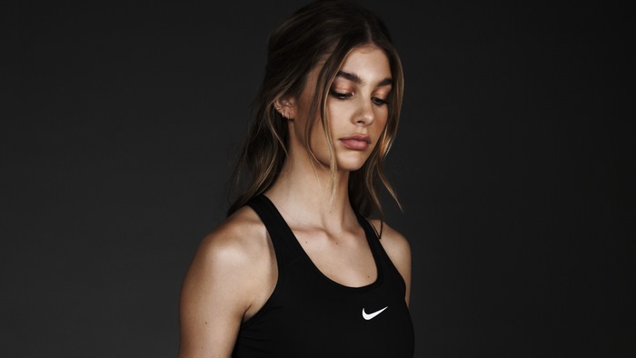 Camila Morrone wearing Nike sports bra