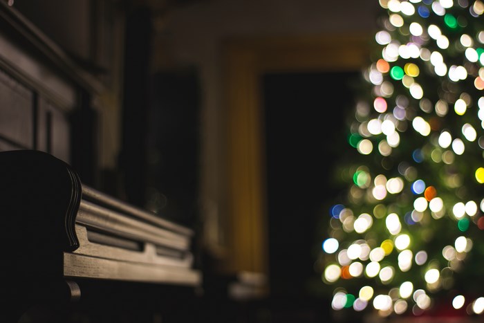 Piano and Christmas Tree with Bokeh Lights