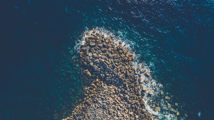 Aerial view of a rocky coastline in Jaffa, Israel