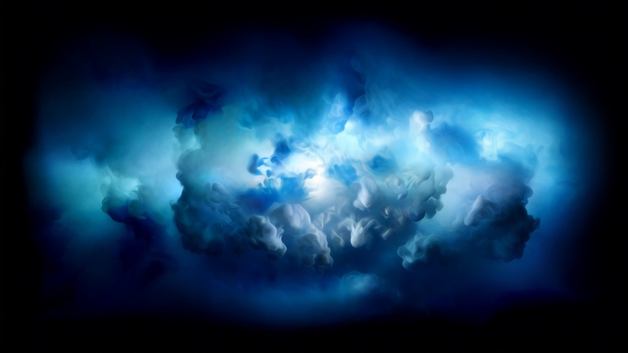 Abstract blue and white smoke on black background