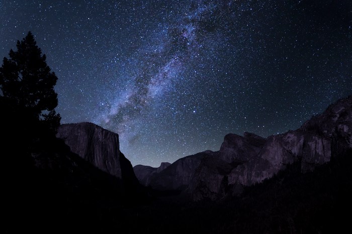 Milky Way over Yosemite Valley mountains