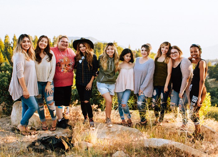 Group of diverse women posing outdoors