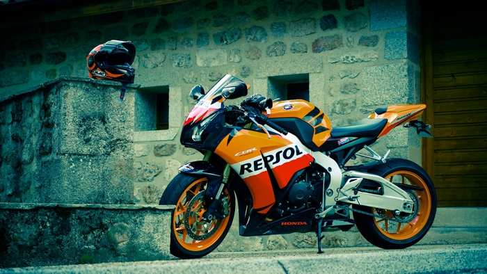 Honda CBR Repsol motorcycle with helmet