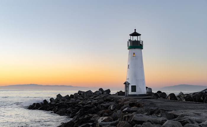 Lighthouse on Rocky Shore at Sunrise in Santa Cruz