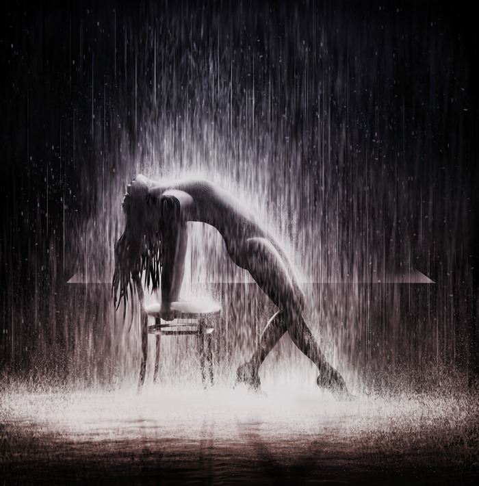 Woman posing in the rain