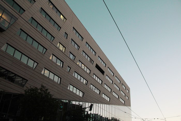 Modern architecture building with glass windows and sky