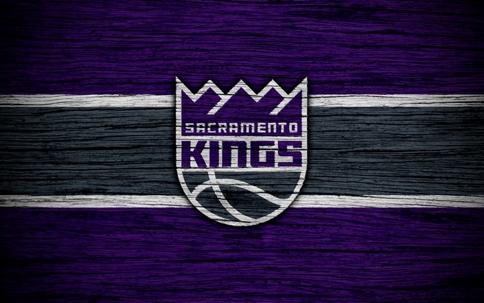 Sacramento Kings Logo on Purple and Gray Wood Texture