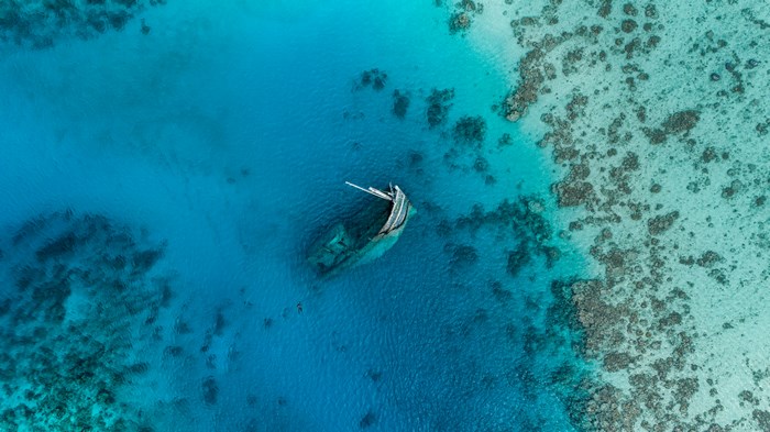 Aerial View of Shipwreck on Maldives Tropical Reef