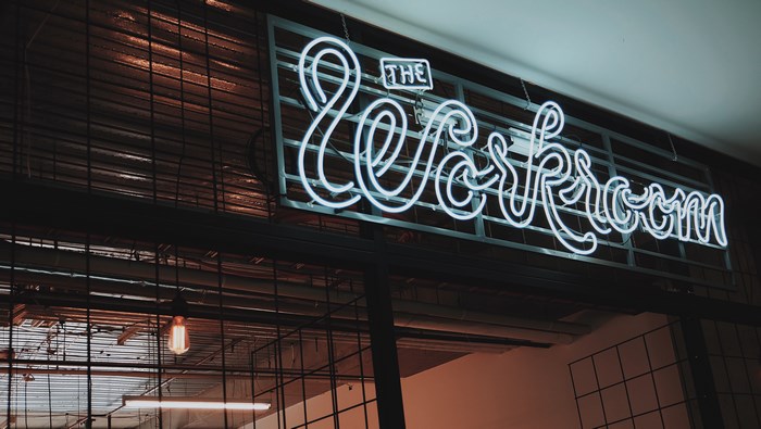 Neon sign for The Workroom