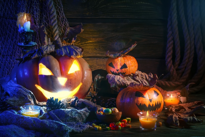 Halloween still life with jack-o-lanterns and candles