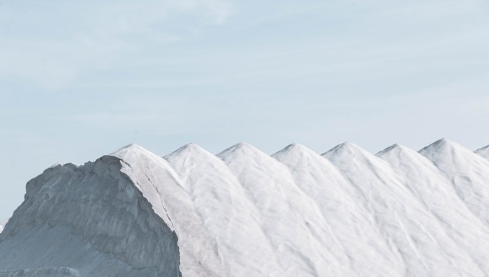 Salt mountains under a clear sky in Spain