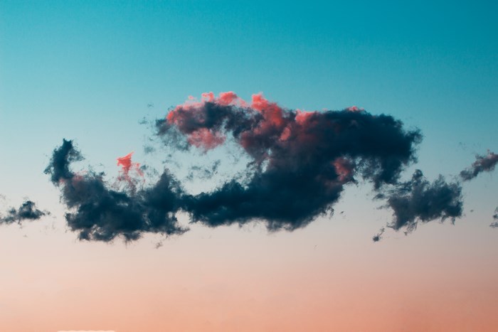 Dramatic cloud in a pink and blue sky