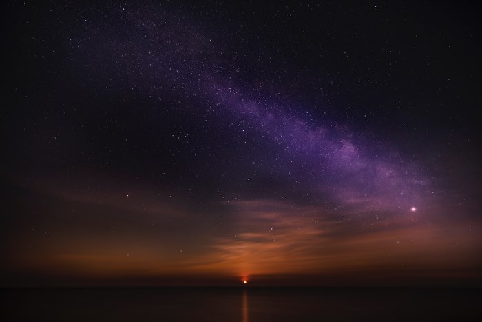 Milky Way over the ocean at sunset