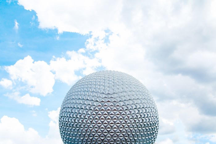 Spaceship Earth at Epcot against a cloudy sky