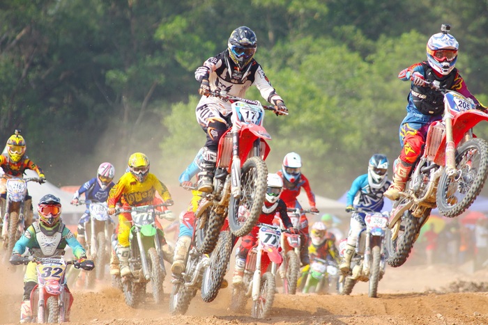 Motocross race with multiple riders in action