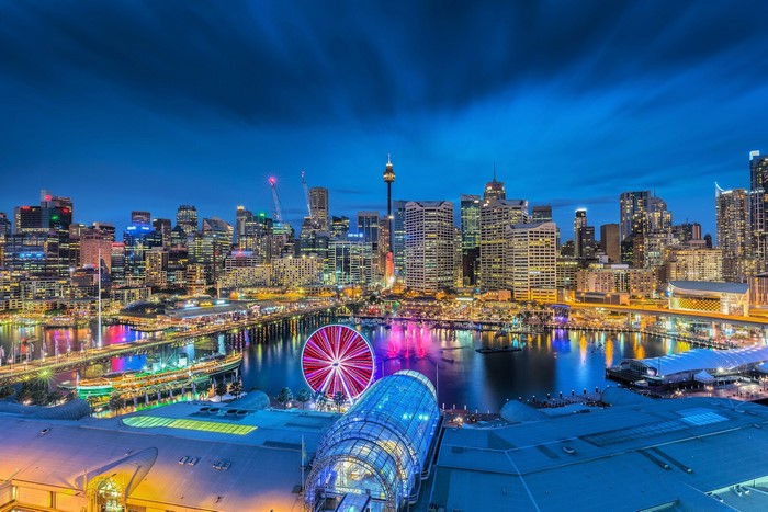 Sydney Harbour at night with Ferris wheel and city skyline
