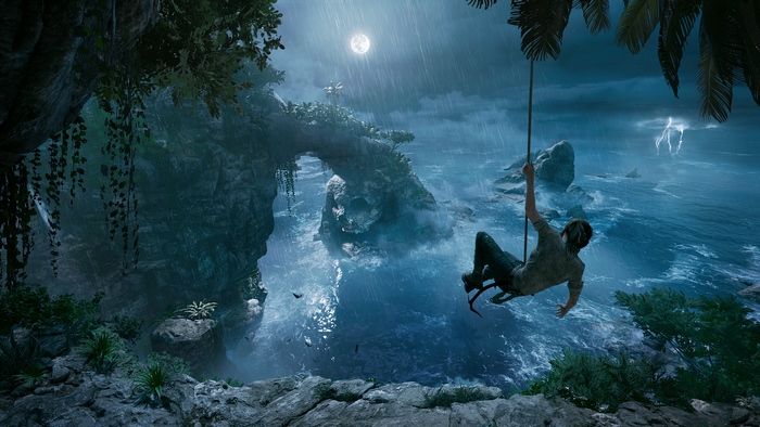 Lara Croft swinging on a rope in Shadow of the Tomb Raider