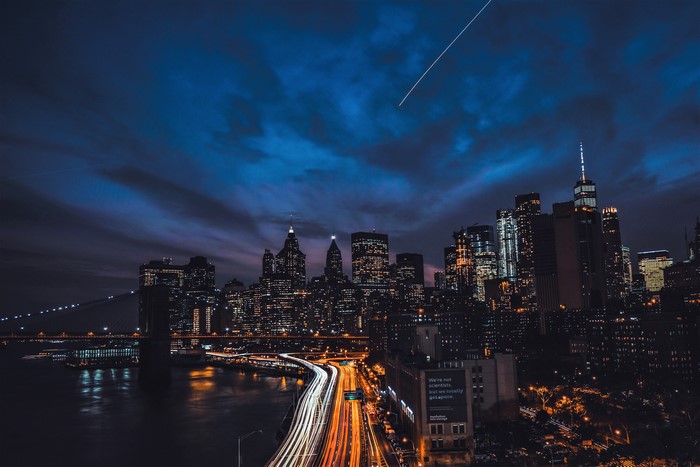 New York City Skyline at Night with a Meteor