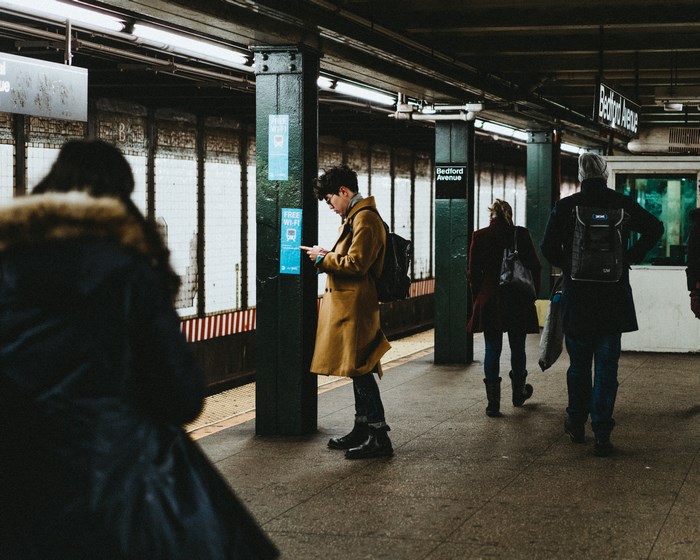 People on a subway platform at Bedford Avenue station