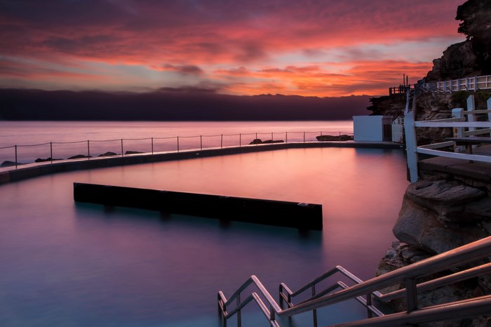 Bronte Beach natural pool at sunrise with red sky