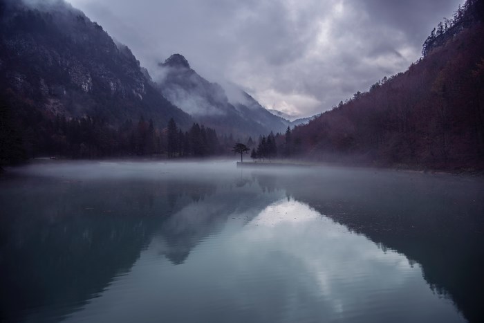 Misty Mountain Lake at Dusk with Reflections