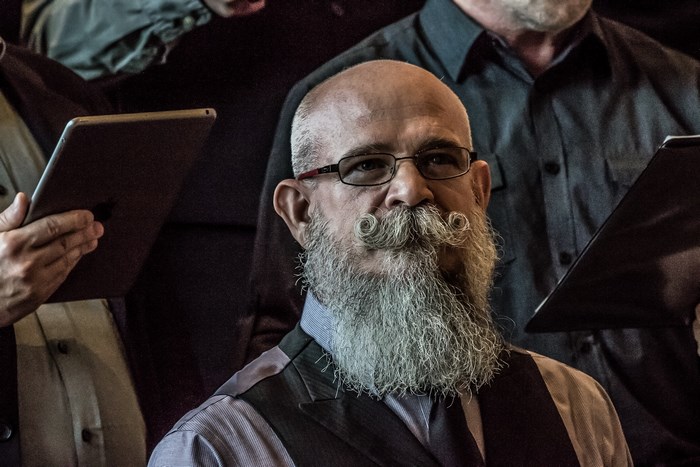 Man with beard and mustache wearing glasses