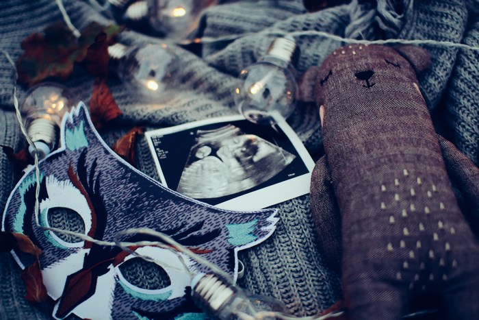 Ultrasound, Mask, Stuffed Animal, and Lights on Blanket