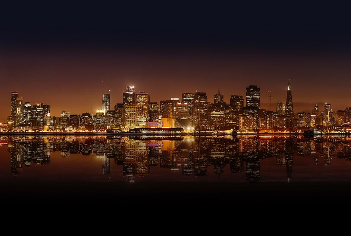 San Francisco skyline at night with reflections