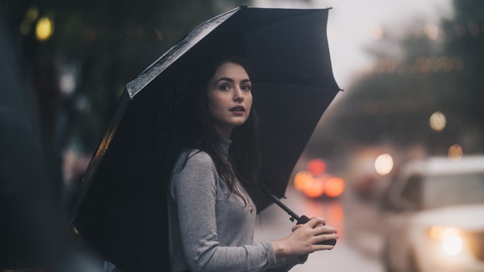 Woman holding an umbrella in the rain