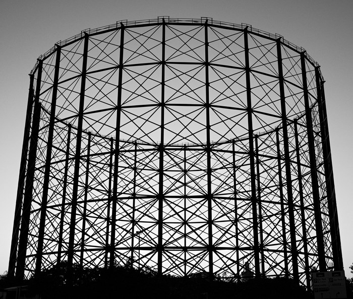 Black and white image of a gas holder structure