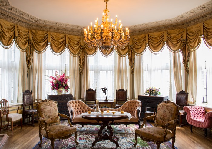 Vintage living room with chandelier and ornate furniture