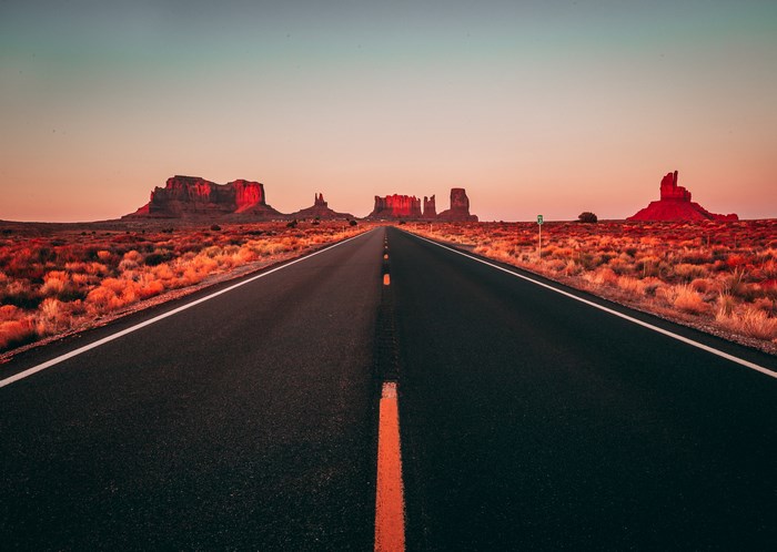Monument Valley Road at Sunrise or Sunset