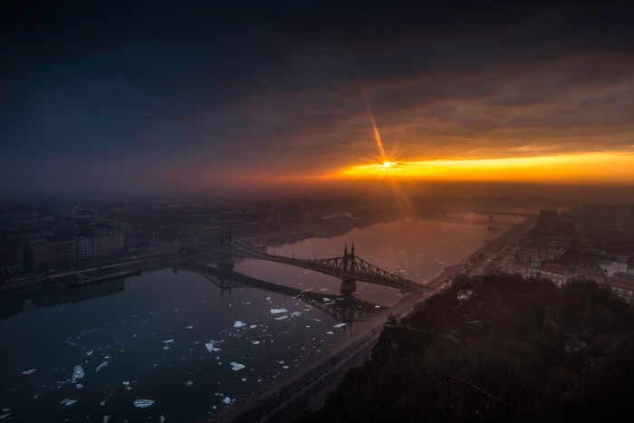 Budapest cityscape at sunrise with Liberty Bridge over Danube River