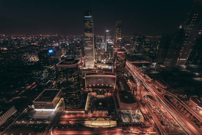 Night cityscape of Beijing CBD with skyscrapers and traffic